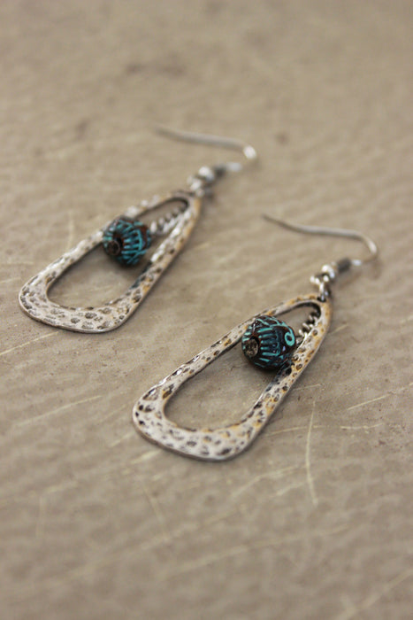 Hammered Open Oval And Dangling Ball Earring